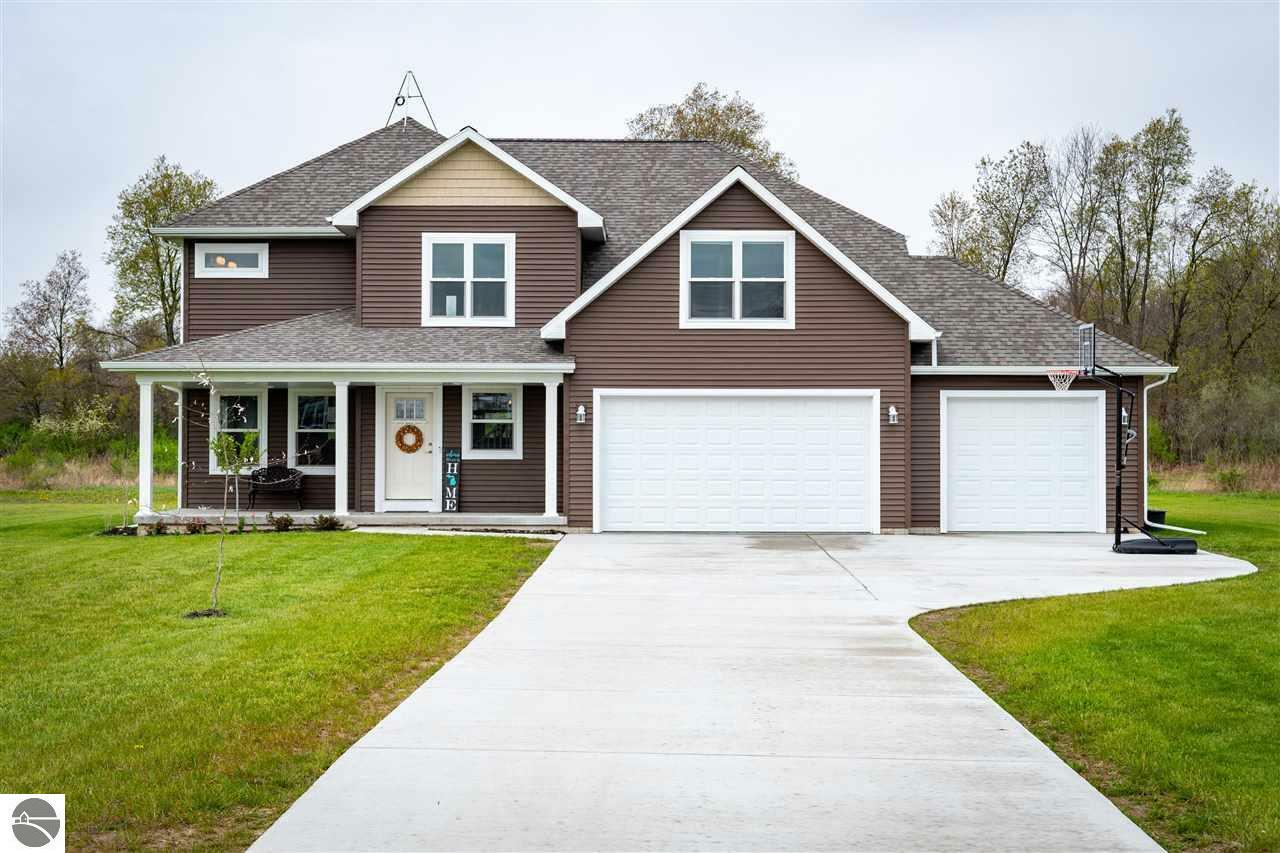 Property Photo:  2590 White Pine Drive  MI 48858 