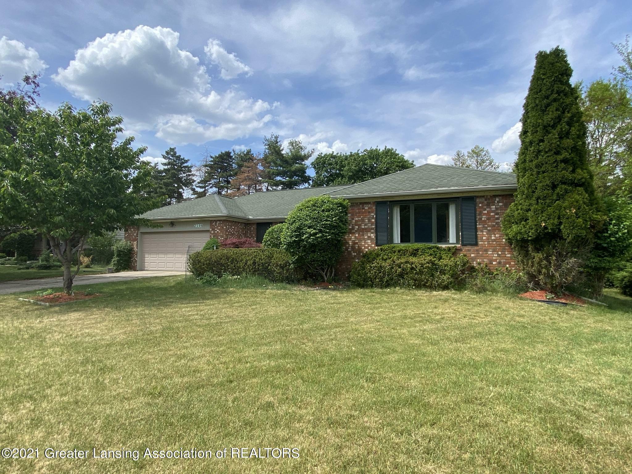 Property Photo:  2146 Riverwood Drive  MI 48864 