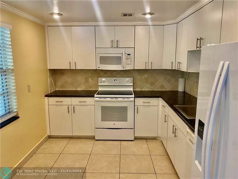 Property Photo:  800 Cypress Blvd 203  FL 33069 