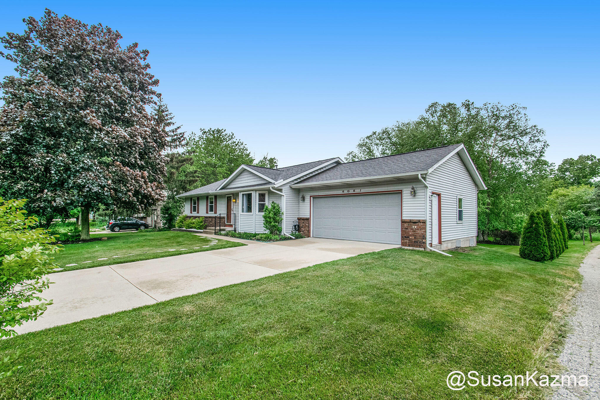 Property Photo:  6061 Samrick Avenue NE  MI 49306 