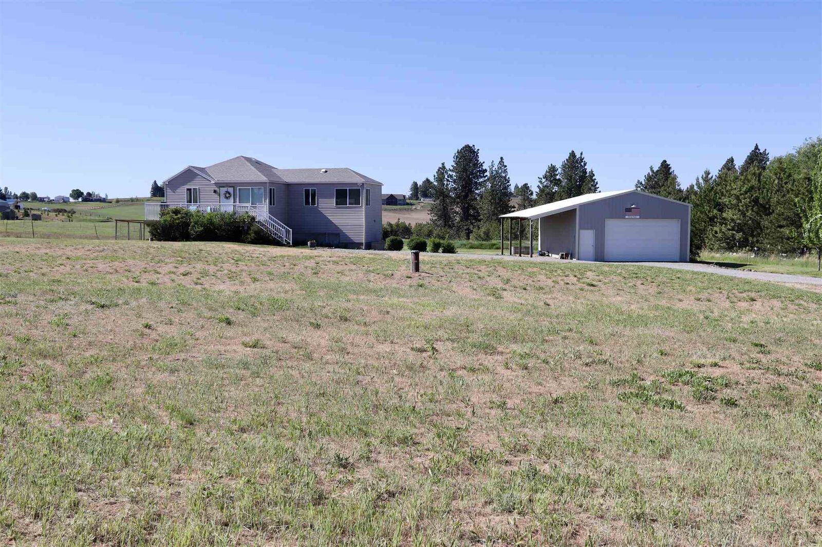 Property Photo: 11720 E Connor Rd WA 99036