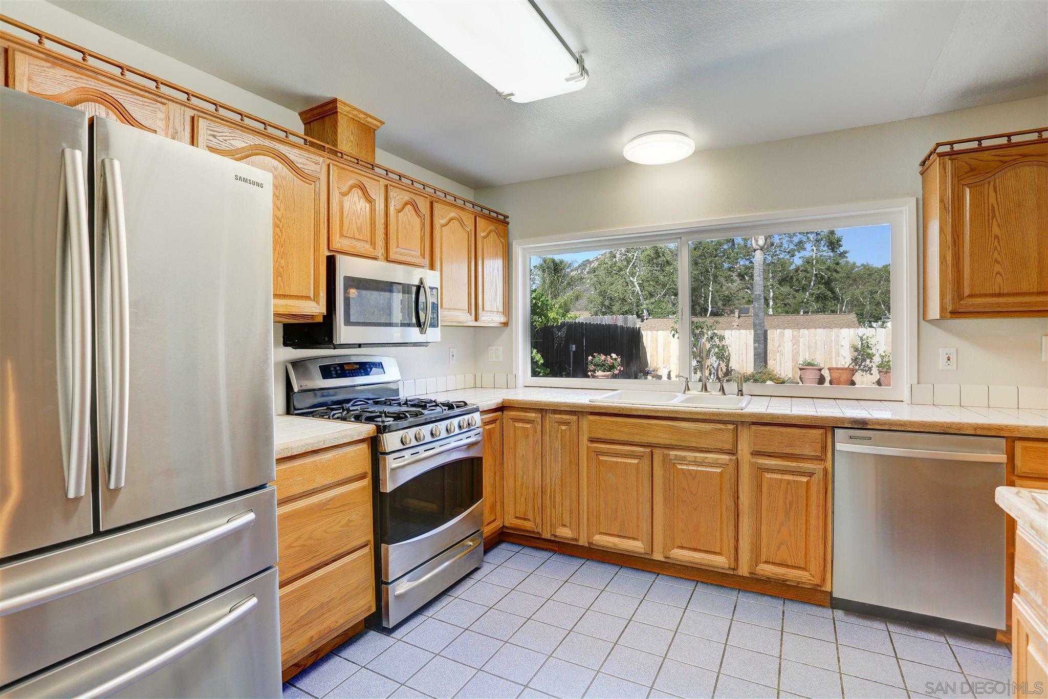 Property Photo:  10619 Ironwood Ave  CA 92071 