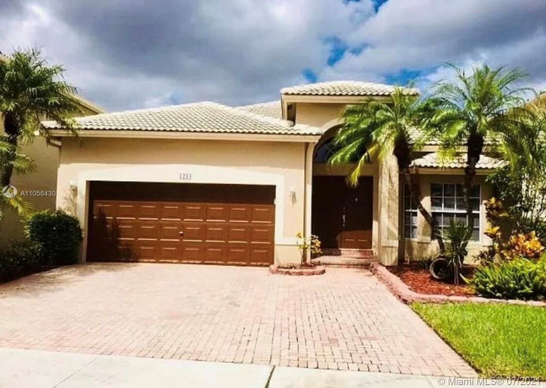 Property Photo: 1244 NW 167th Ave FL 33028
