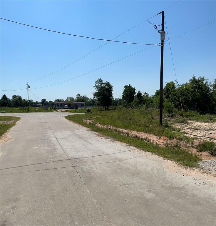 Property Photo:  82 County Road 5013  TX 77327 