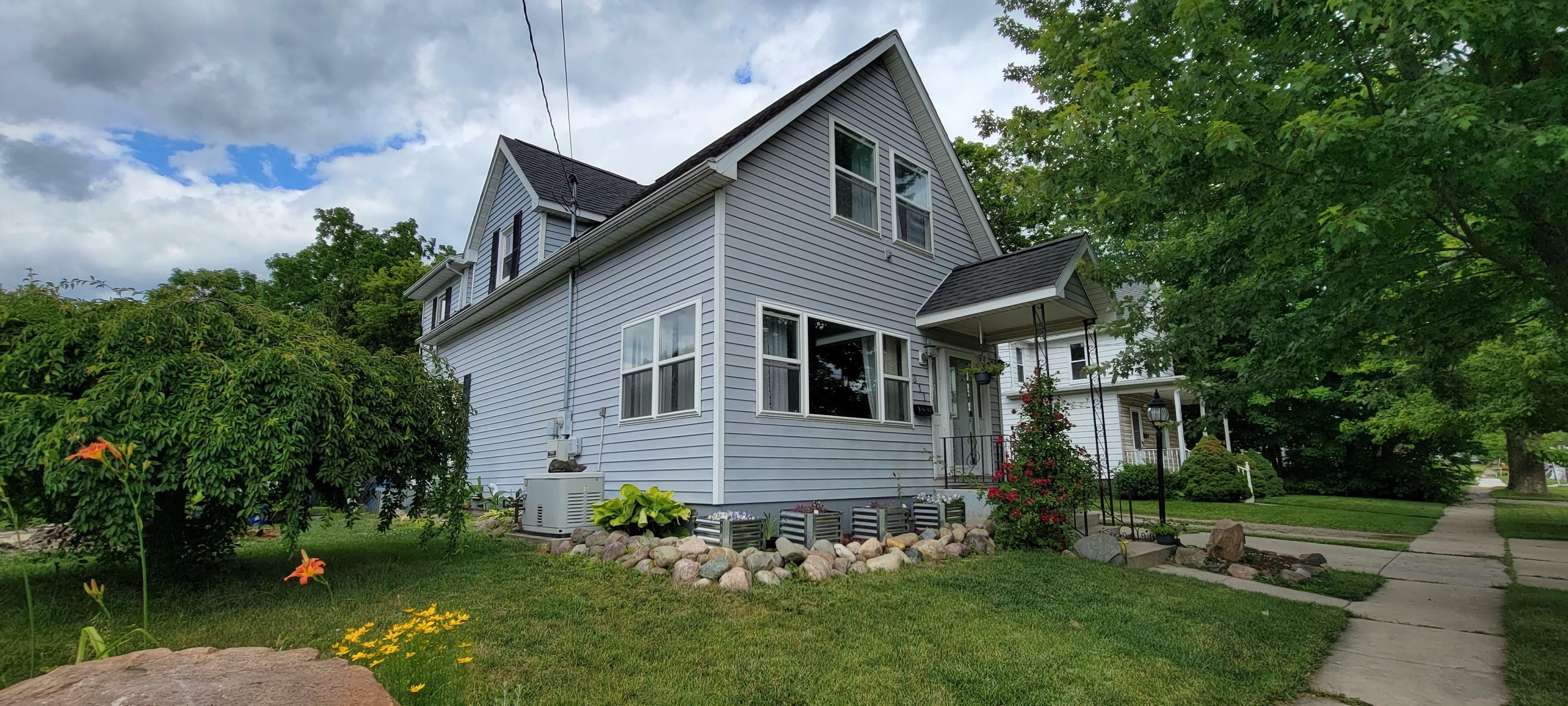 Property Photo:  311 E Hunt Street  MI 49221 