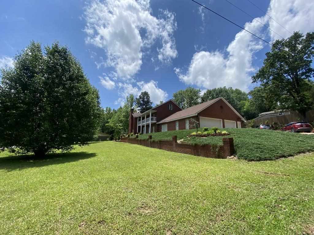 Property Photo:  1403 South Mena Street  AR 71953 