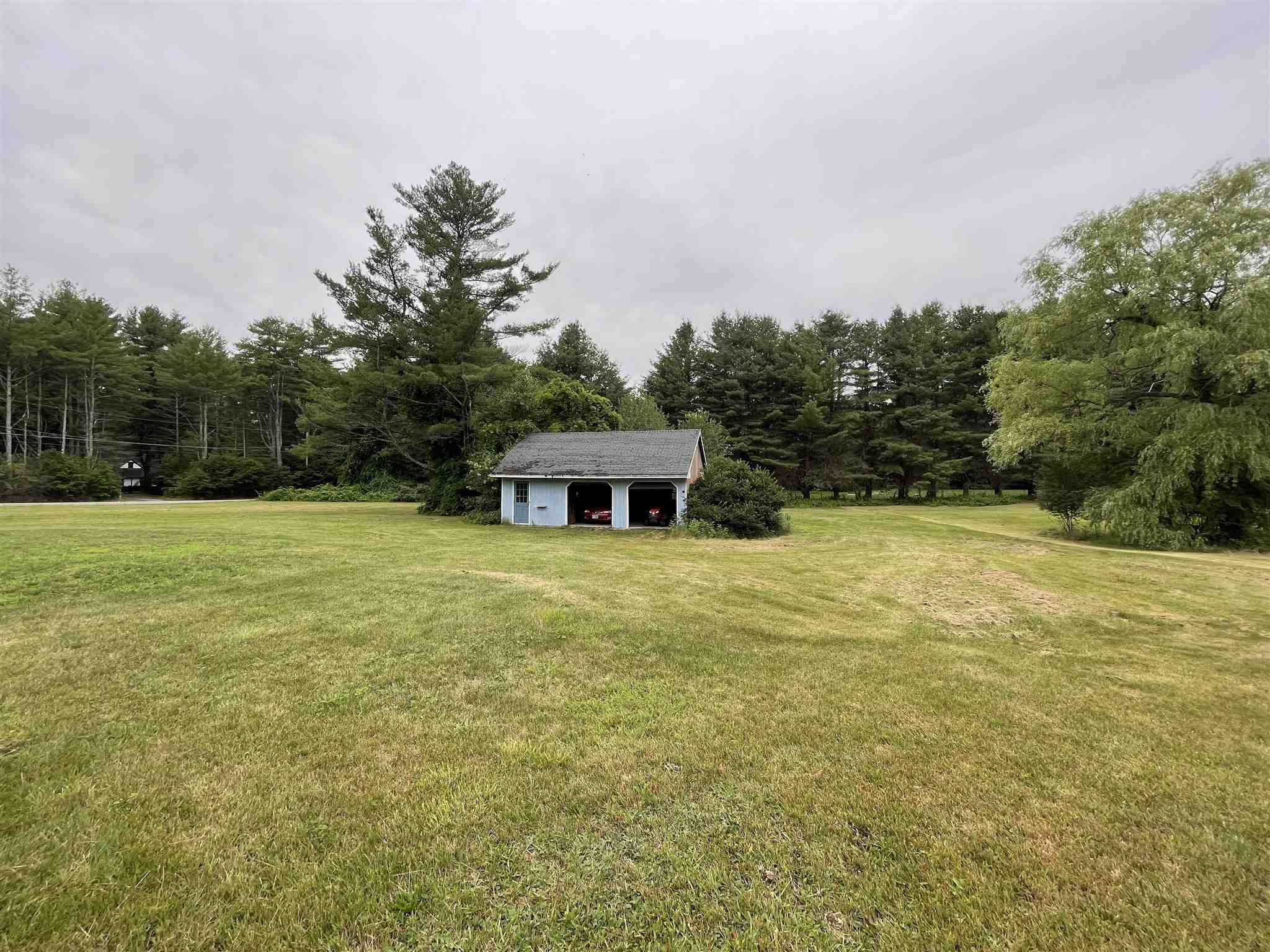 Property Photo:  65 Plummer Road  NH 03110 