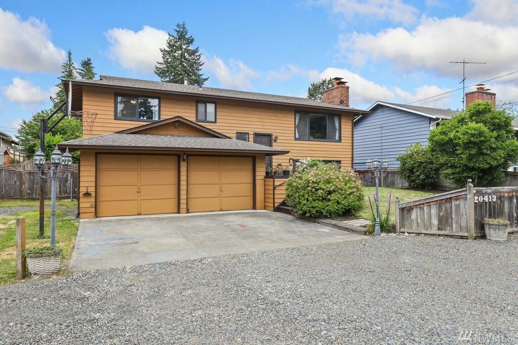 Property Photo:  20413 5th Ave S  WA 98198 