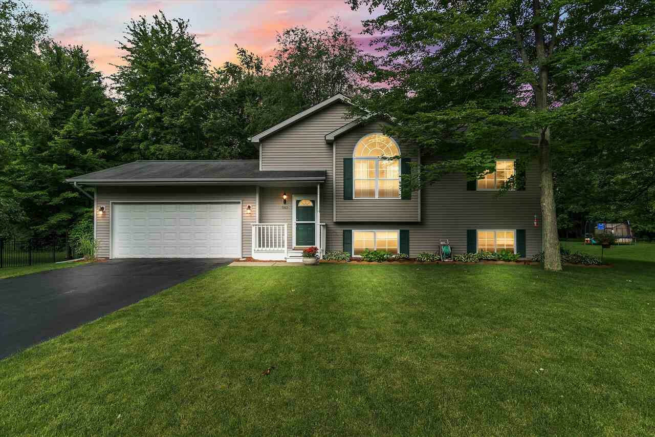 Property Photo:  7965 Village Green Ln  MI 49269 