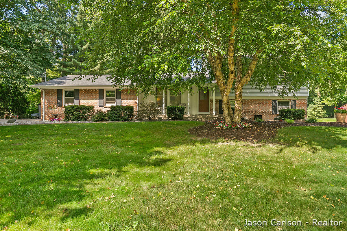 Property Photo:  13945 Windemere Drive NW  MI 49534 