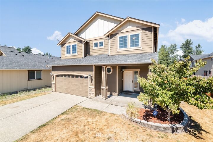 Property Photo:  1215 E 51st  WA 98404 