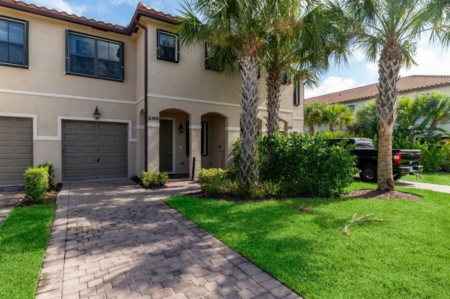 Property Photo:  6169 Bangalow Drive  FL 33463 