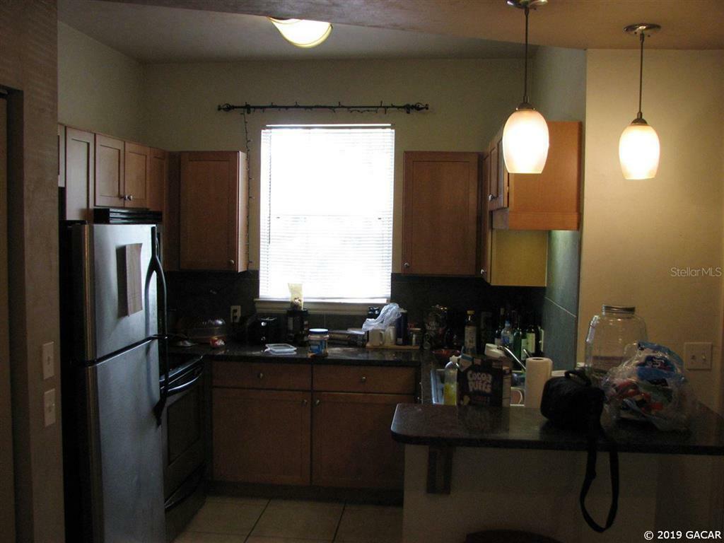 Property Photo:  3037 SW Archer Road  FL 32608 