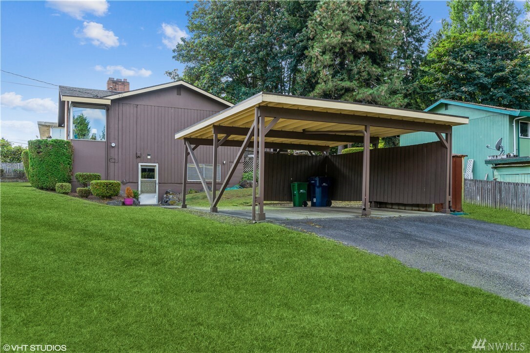 Property Photo:  10415 9th Ave S  WA 98168 