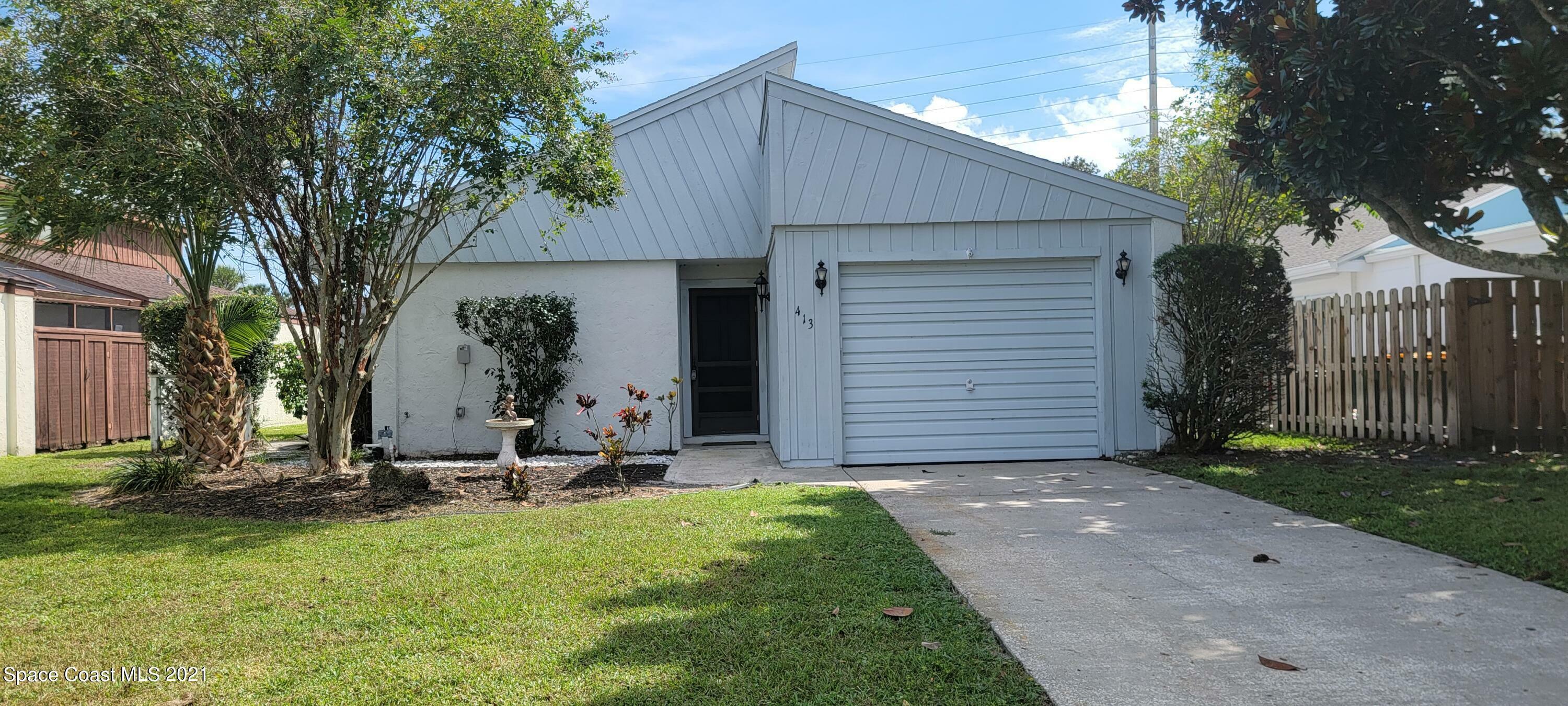 Property Photo:  413 Willow Tree Drive  FL 32940 