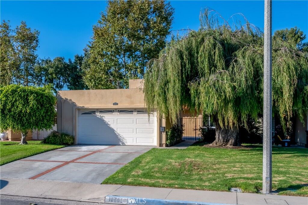 Property Photo:  10803 Los Jardines E  CA 92708 