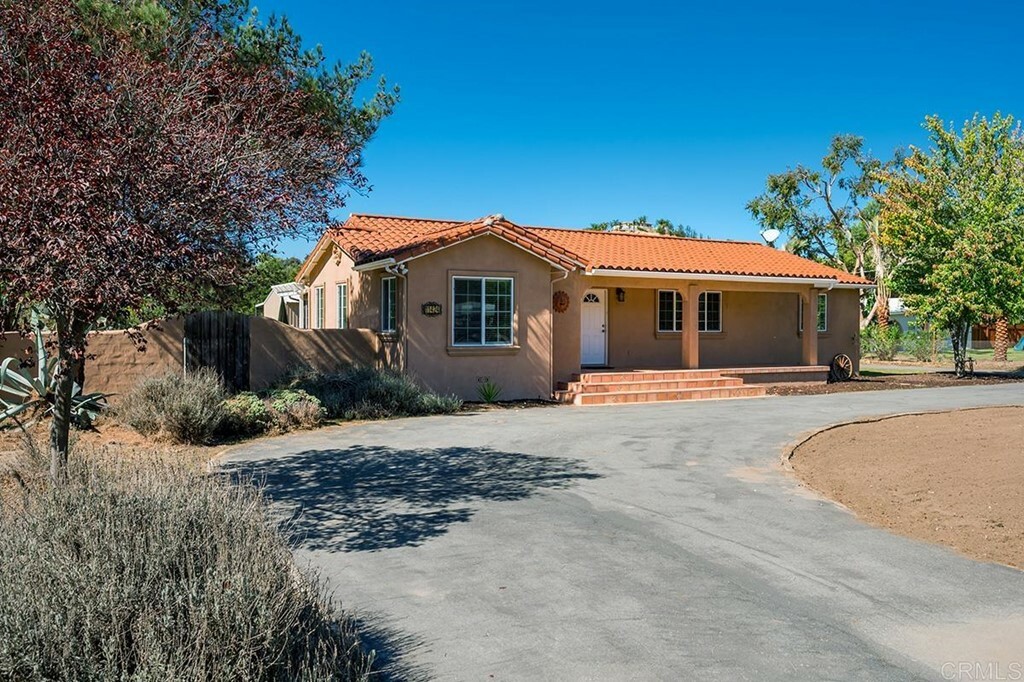 Property Photo:  11424 Moreno Avenue  CA 92040 