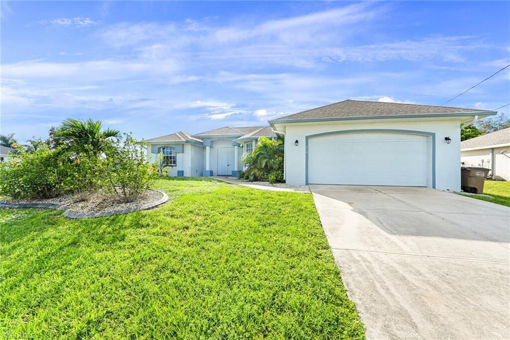 Property Photo:  214 NW 27th Pl  FL 33993 