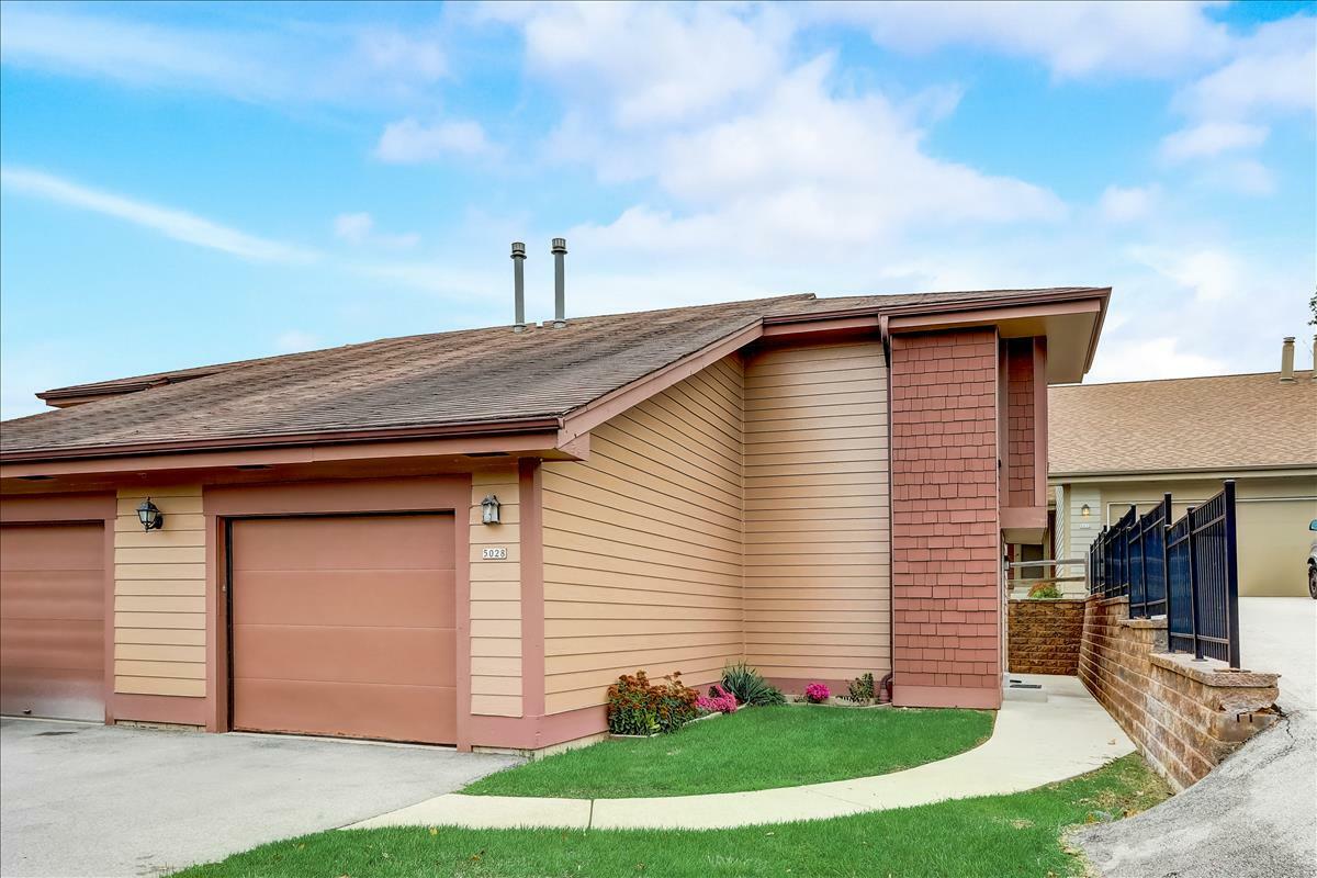 Property Photo: 5028 S Stonehedge Dr WI 53220
