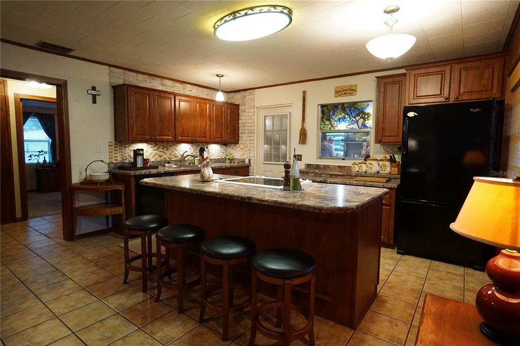 Property Photo:  13020 N Ridge Boulevard  FL 34711 