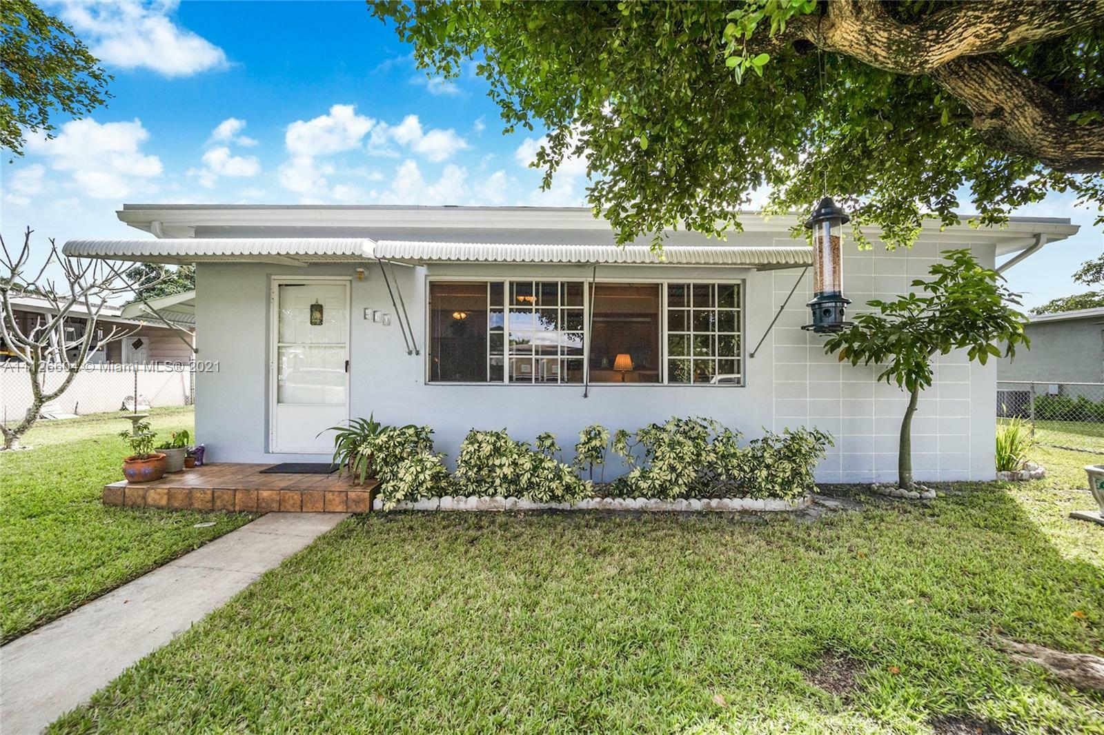 Property Photo:  430 NW 134th St  FL 33168 