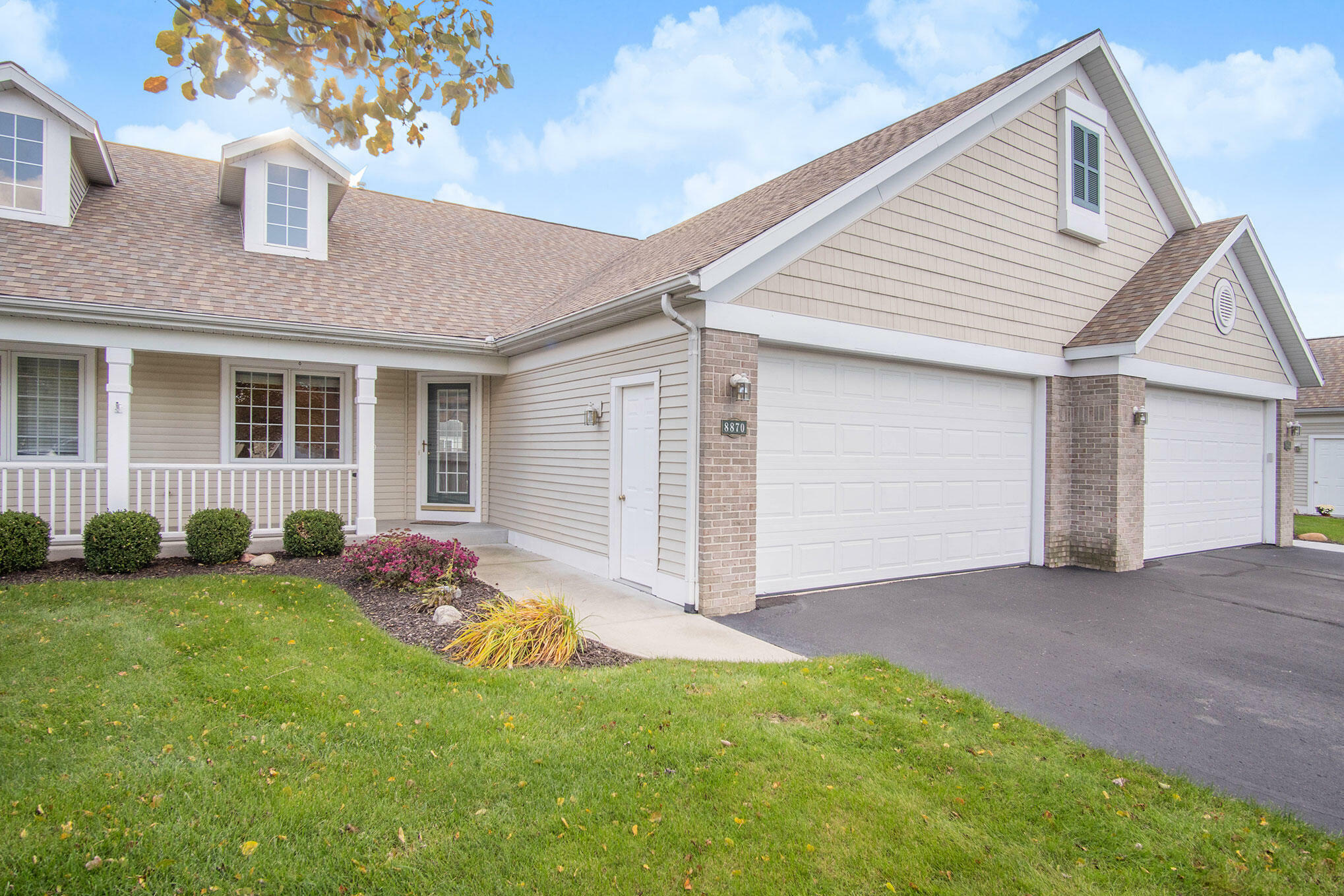 Property Photo:  8870 Peninsula Court  MI 49464 