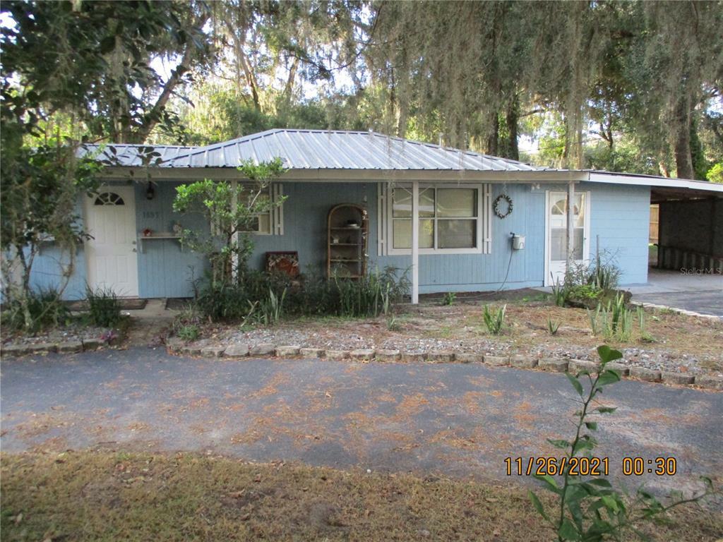 Property Photo:  1883 Cr 422  FL 33538 