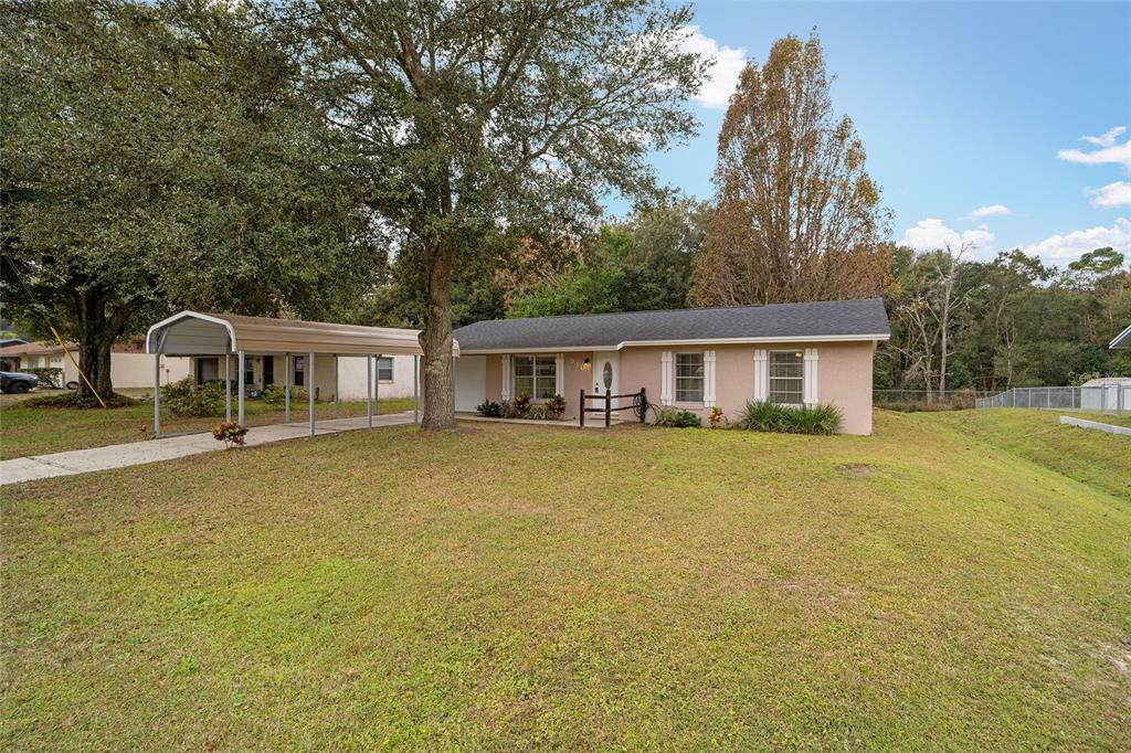 Property Photo:  910 Jacaranda Drive  FL 32159 