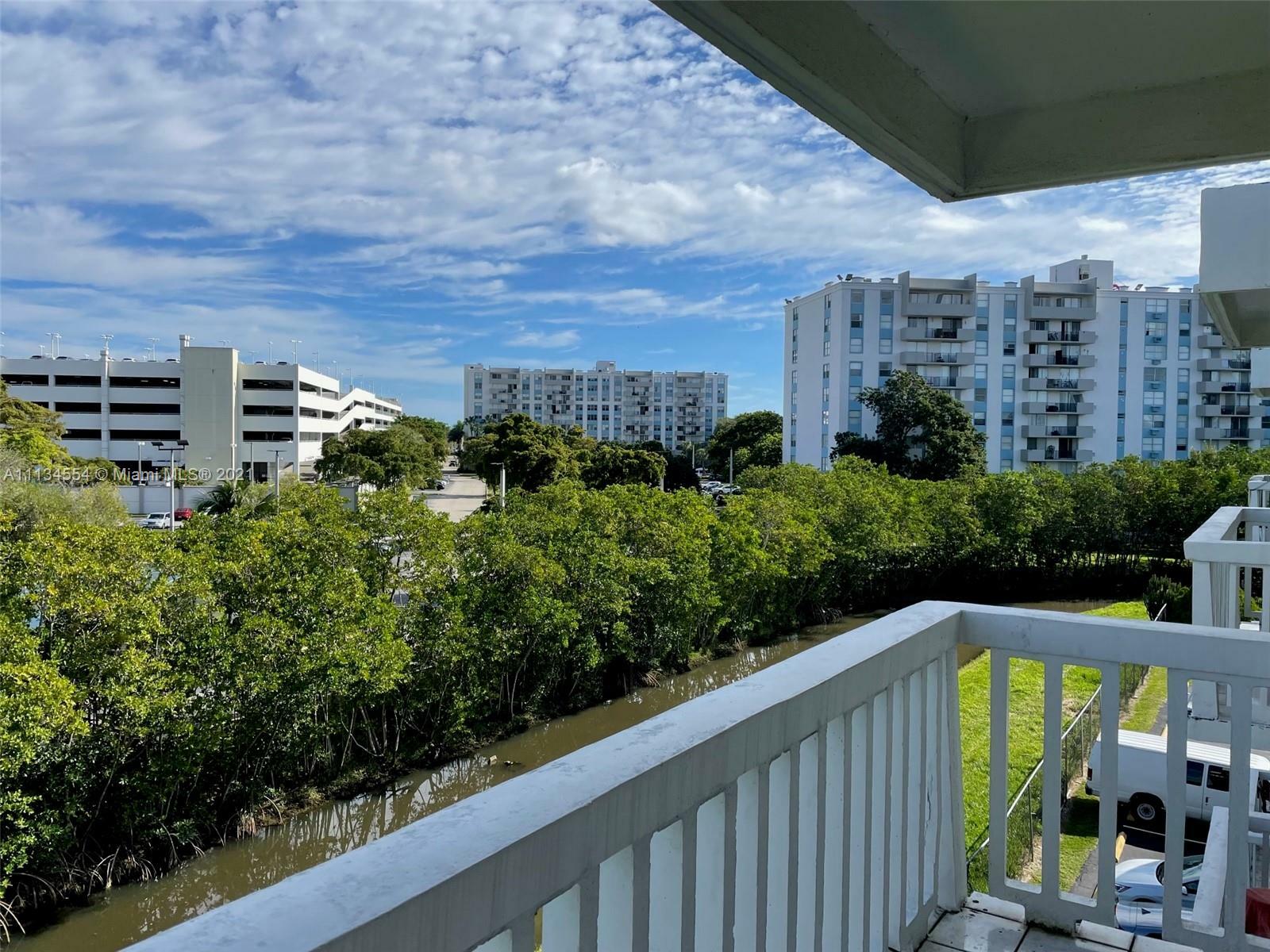 Property Photo:  1801 NE 140th St 305  FL 33181 