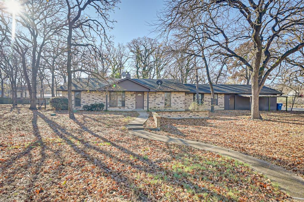 Property Photo: 1000 Oak Tree Drive TX 76140