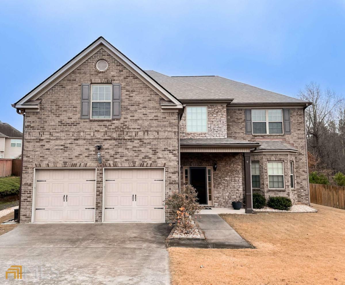 Property Photo: 214 Saintvry Path GA 30349