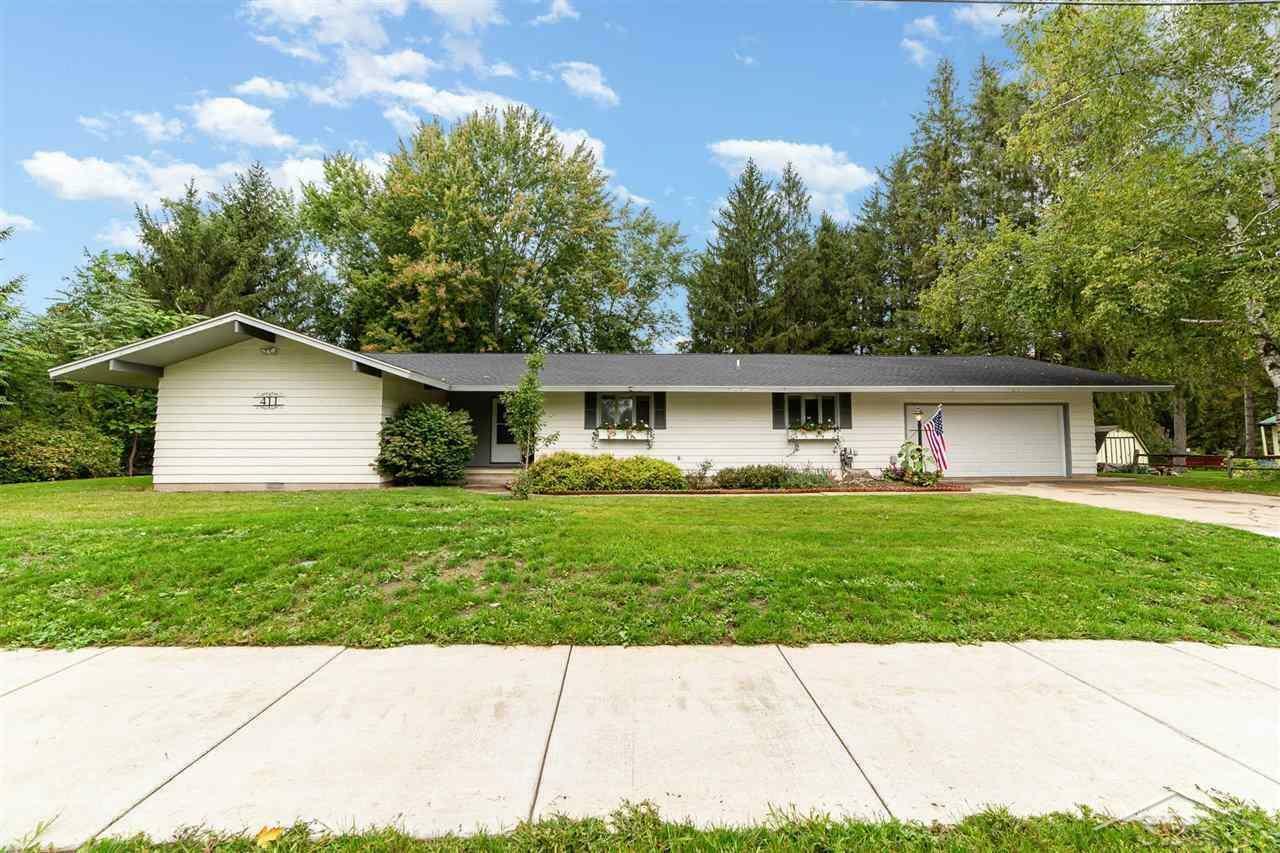 Property Photo:  411 Glidden Road  MI 48612 