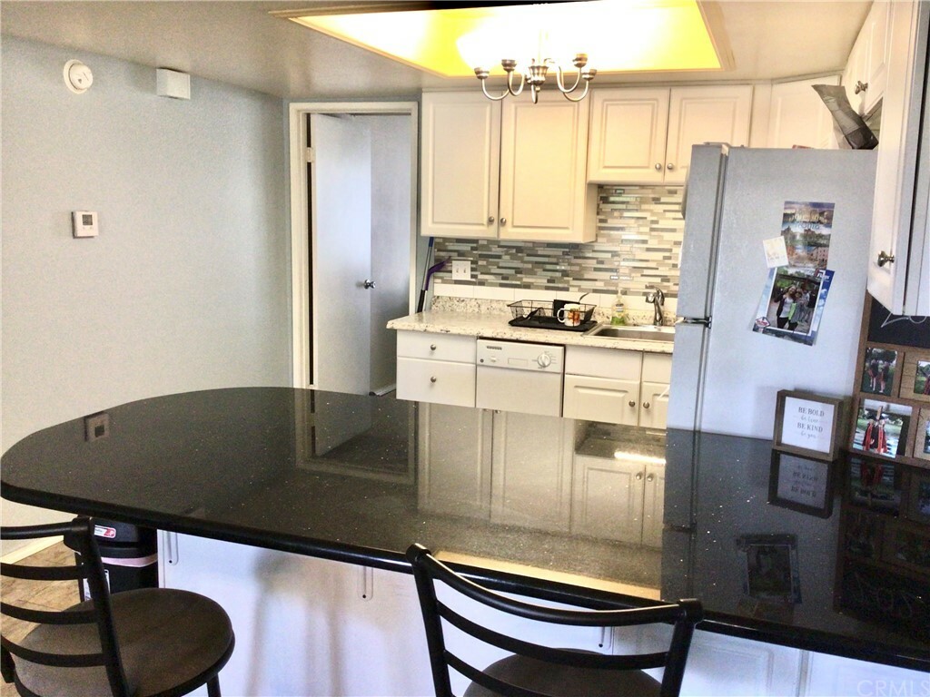 Property Photo:  9649 Spyglass Avenue 90  CA 92240 