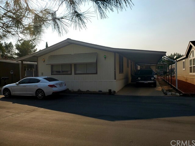 Property Photo:  14000 El Evado Road 19  CA 92392 