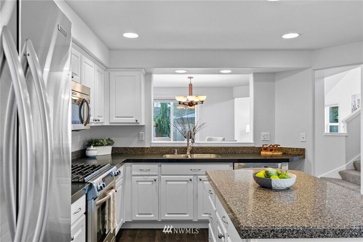 Property Photo:  4719 NE 18th Place B  WA 98059 