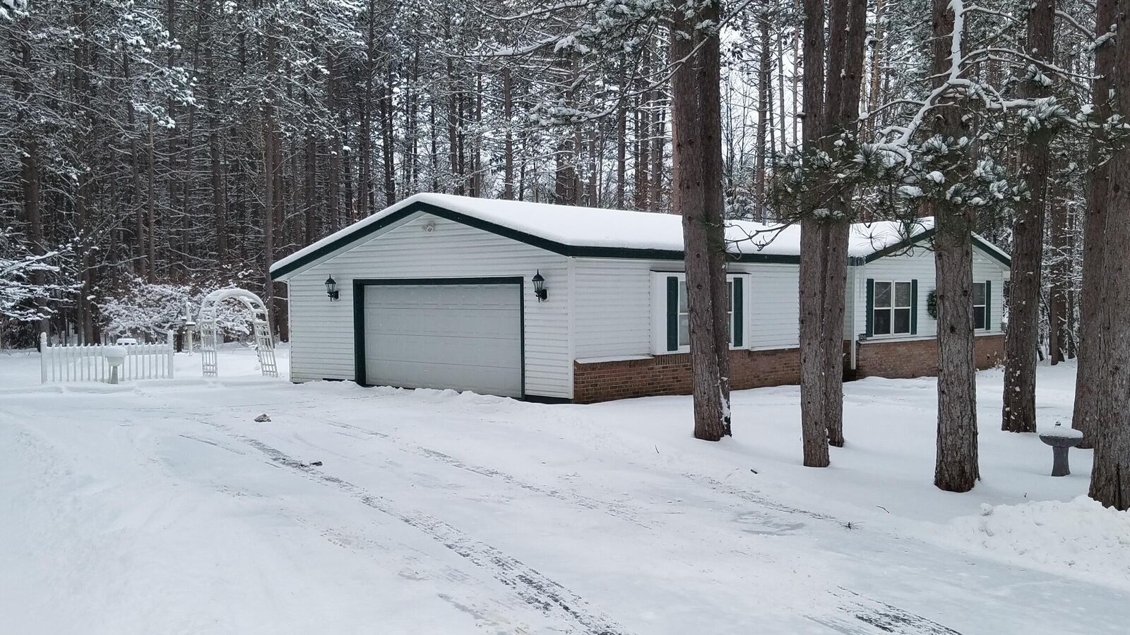 Property Photo:  5242 Campfires Parkway  MI 49735 