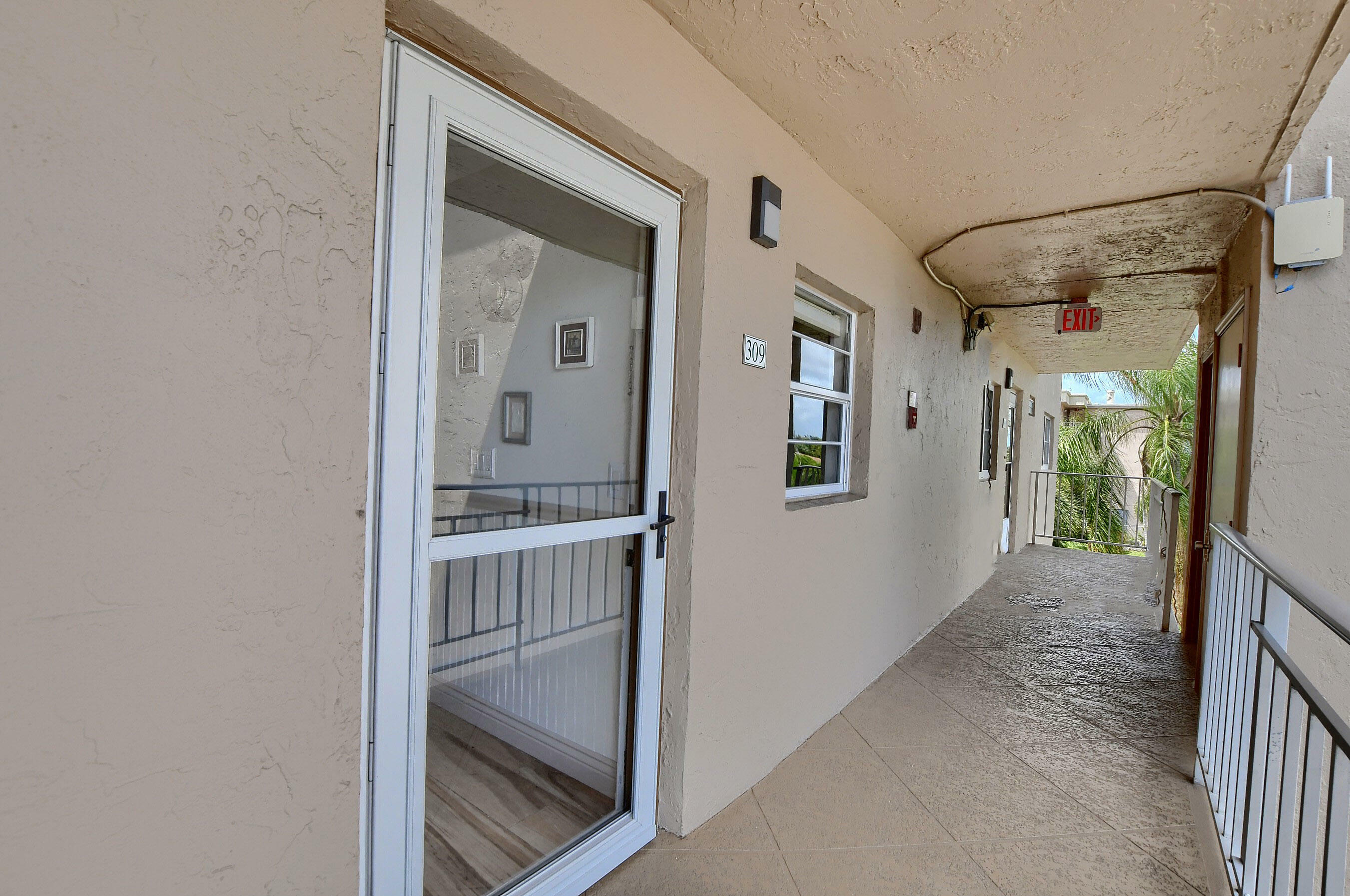 Property Photo:  300 NE 26th Avenue 3090  FL 33435 