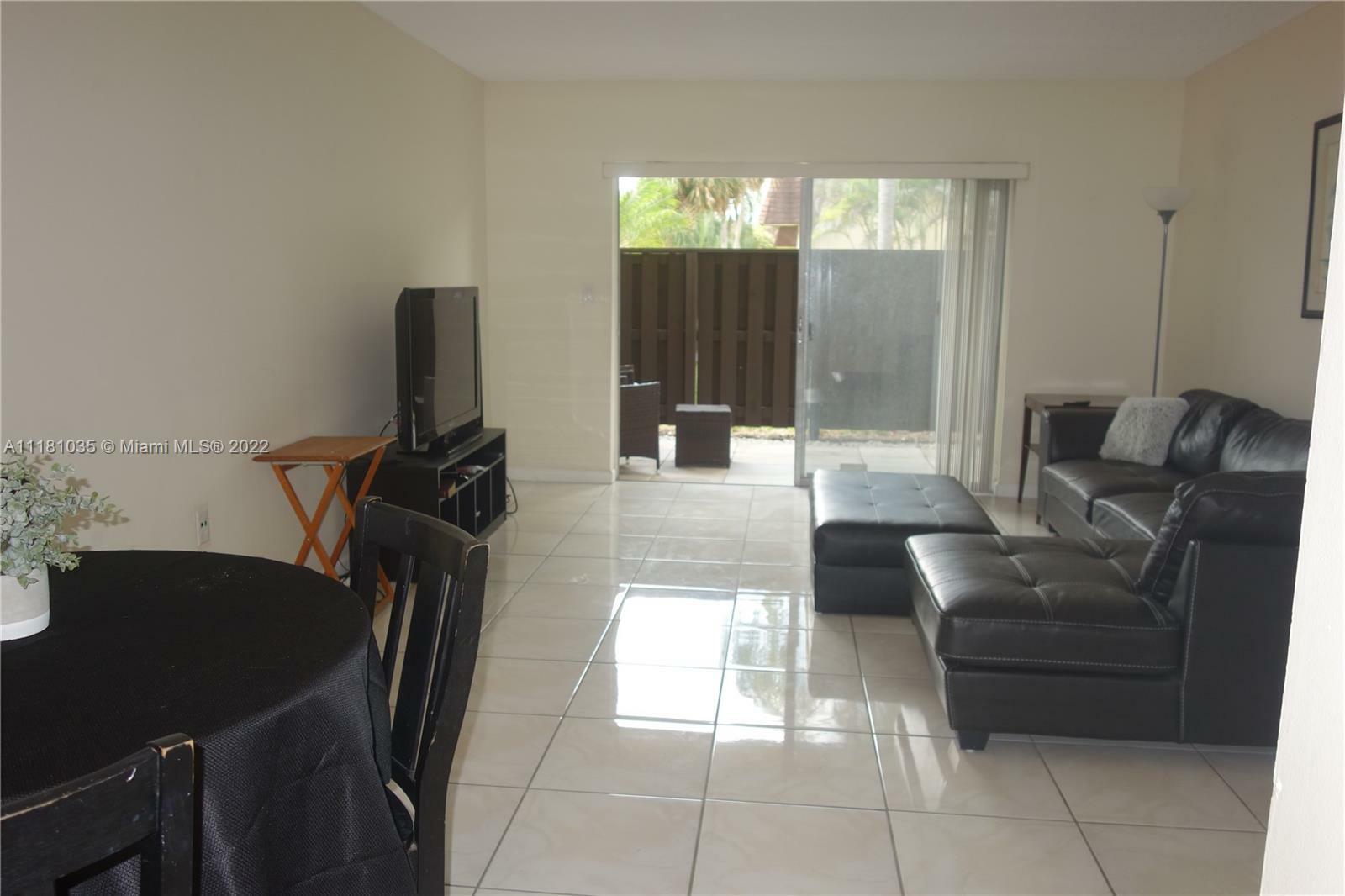 Property Photo:  9101 SW 137 Terrace 13-4  FL 33176 