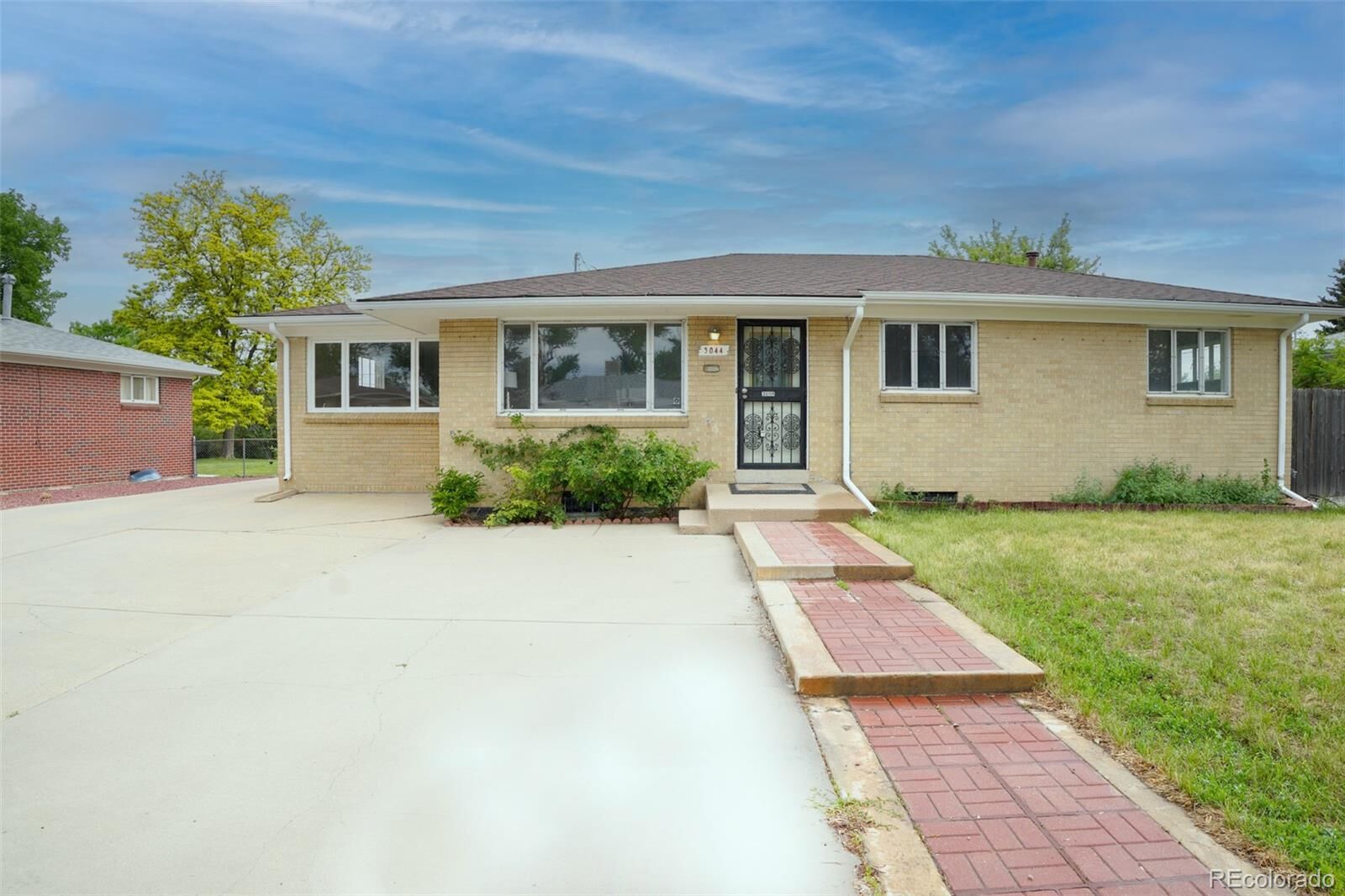 Property Photo:  3044 W Saratoga Avenue  CO 80110