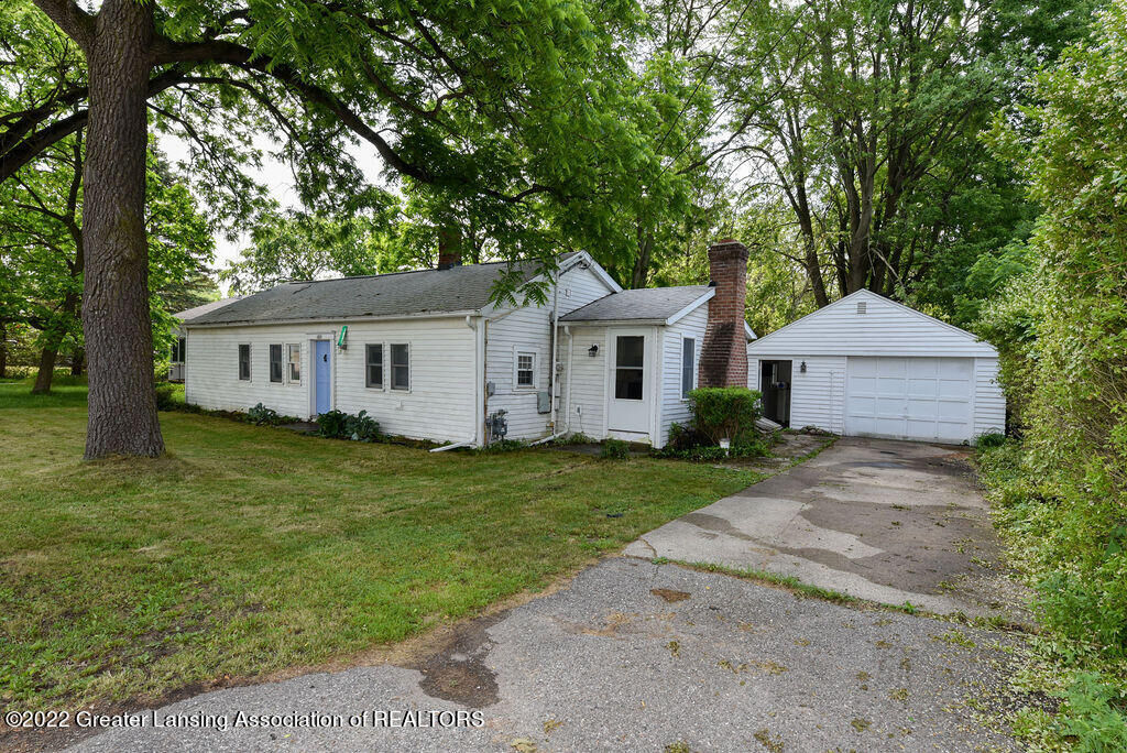 Property Photo:  1031 W State Road  MI 48906 