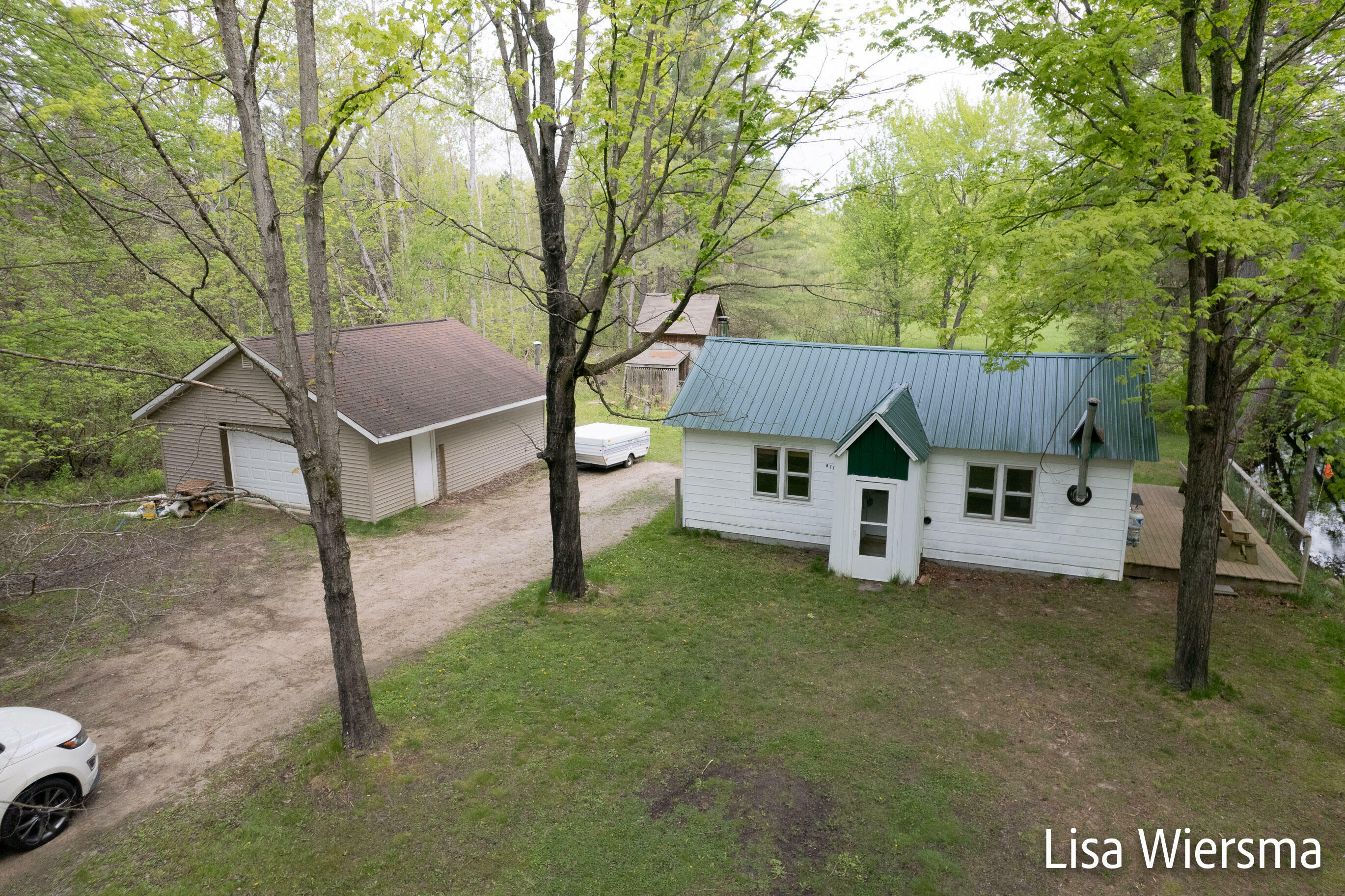 Property Photo:  6189 W 11 Mile Avenue  MI 49309 