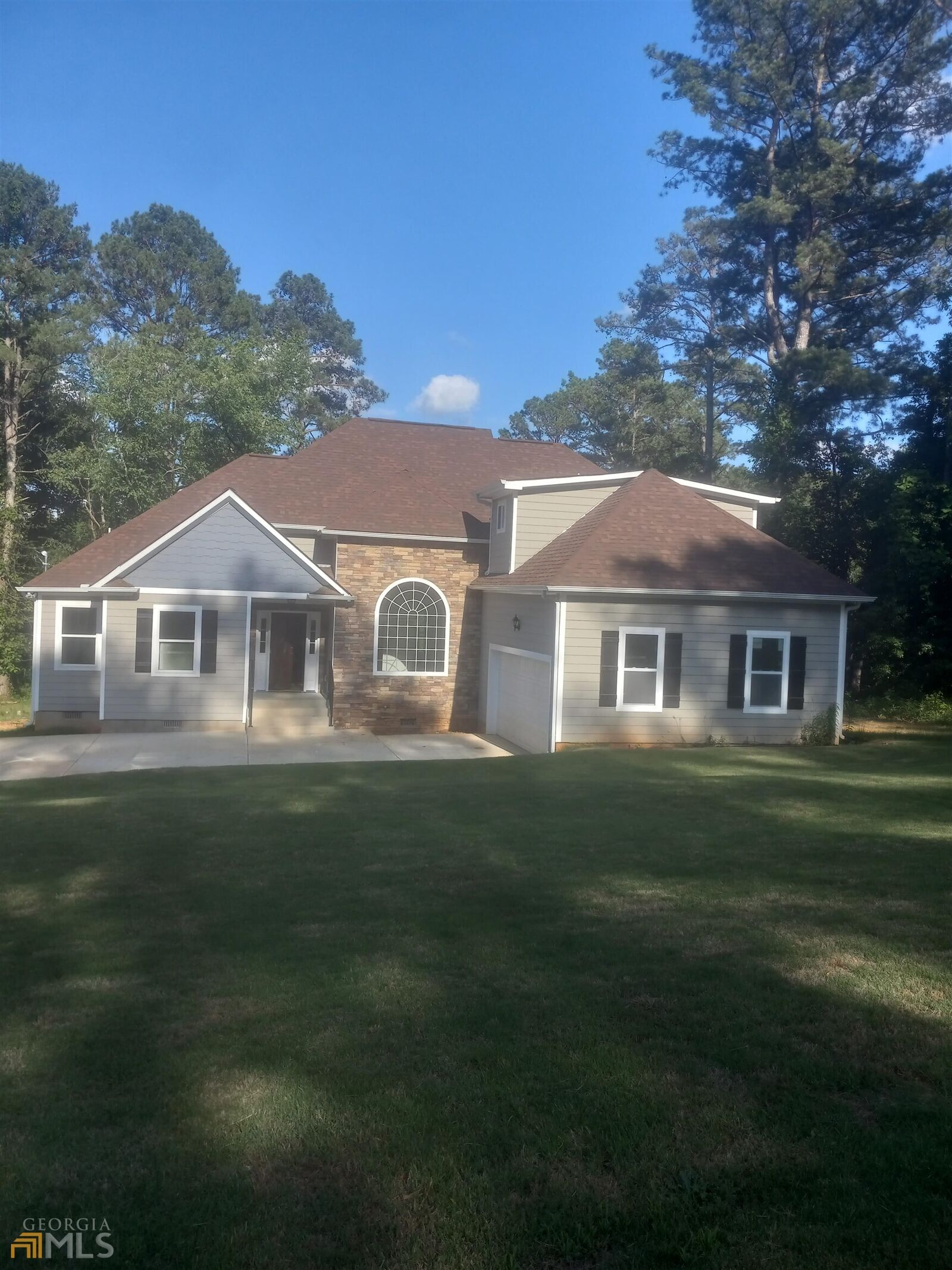 Property Photo:  3700 SE Windy Hill Drive  GA 30013 