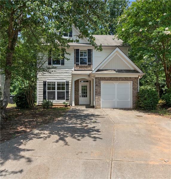 Property Photo:  606 Pond Lillies Road  GA 30045 