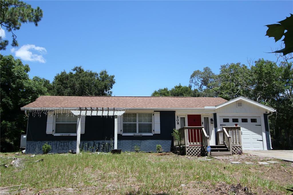 Property Photo: 209 Buena Vista Street FL 32713
