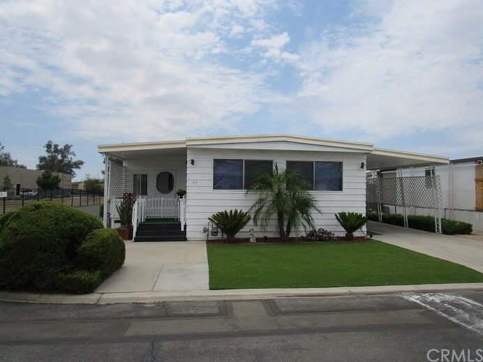 Property Photo:  1895 W Devonshire Avenue 93  CA 92545 