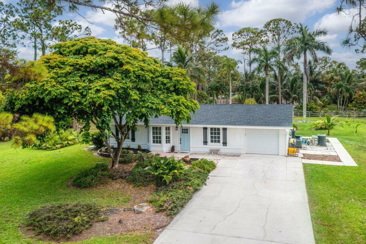 Property Photo:  16114 E Mead Hill Drive  FL 33470 