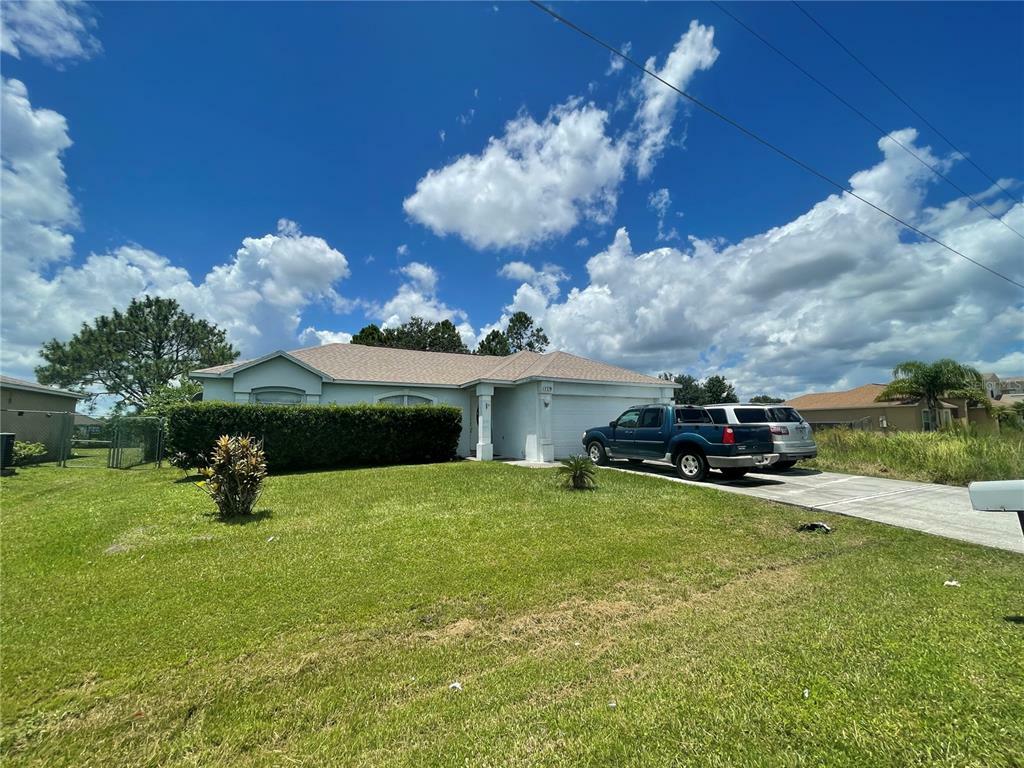 Property Photo:  718 Toulon Drive  FL 34759 