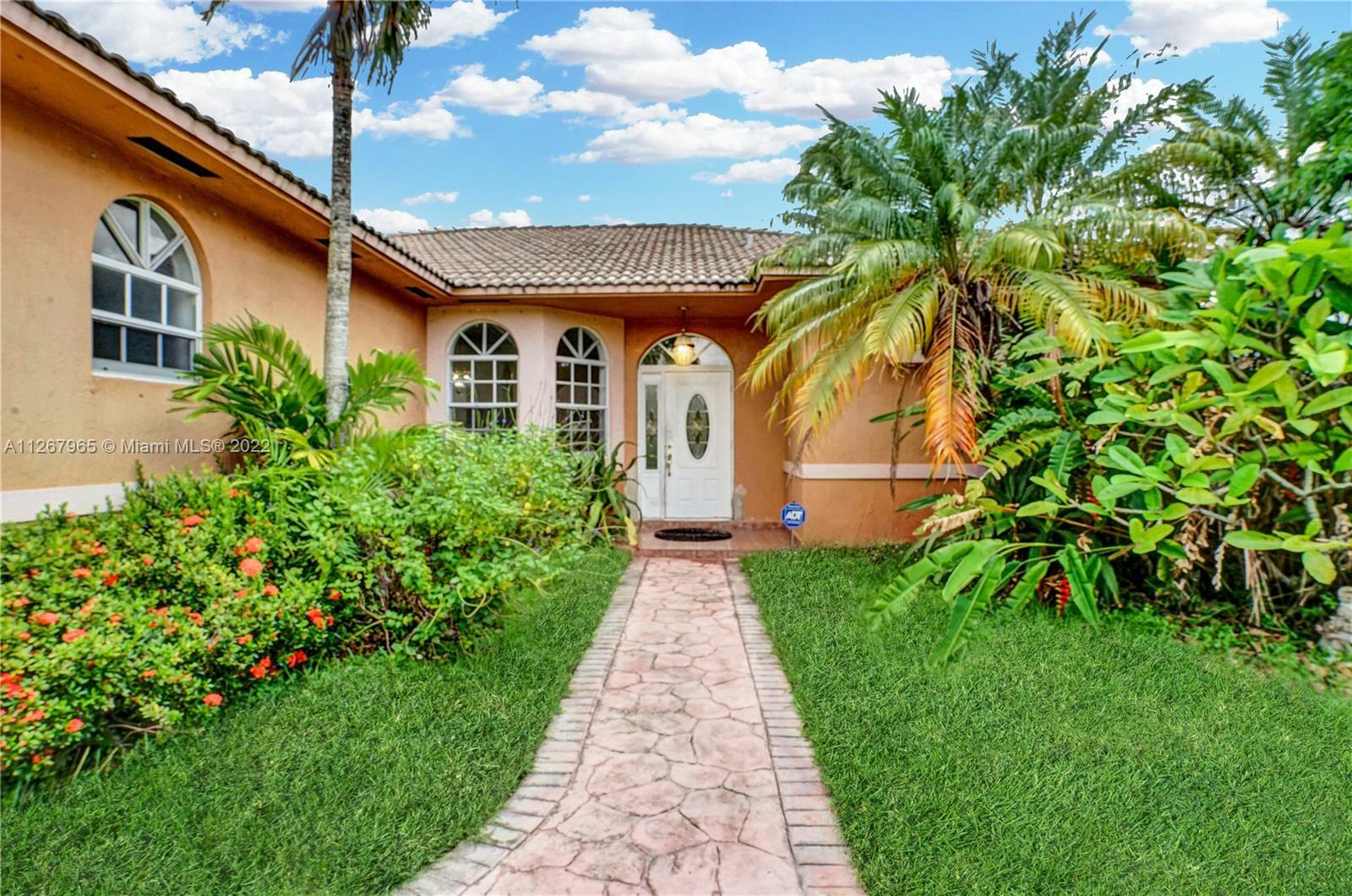 Property Photo:  7661 NW 165th Ter  FL 33015 