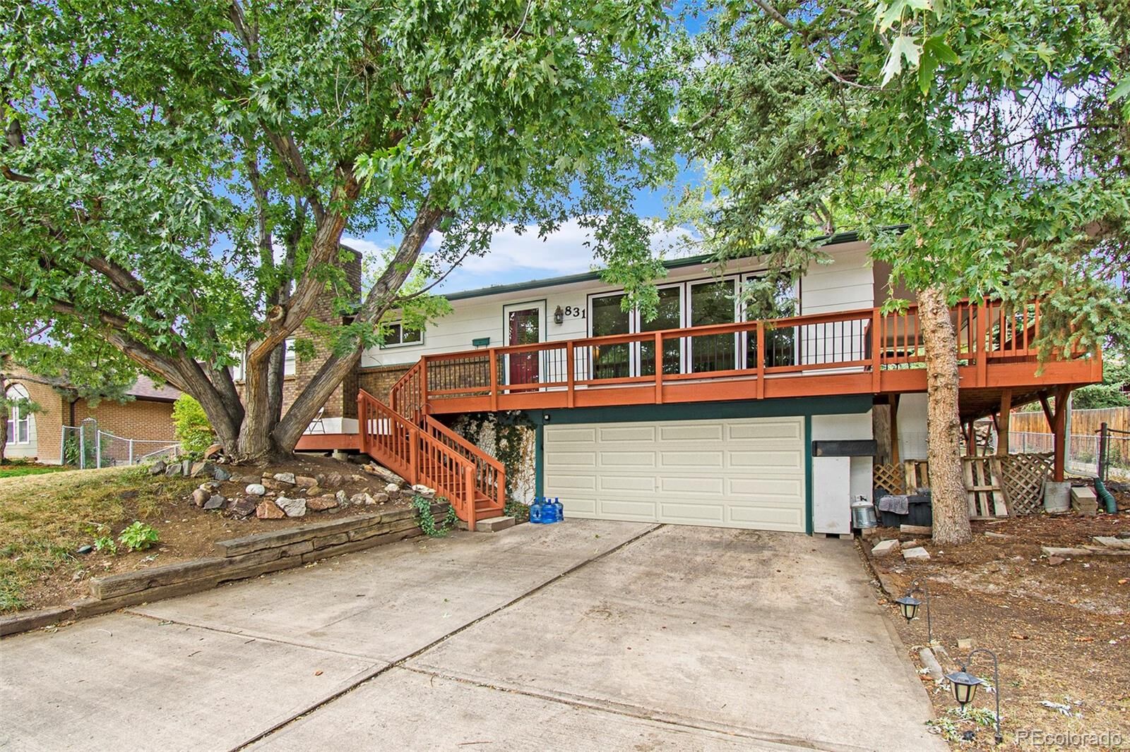 Property Photo:  831 S Arbutus Street  CO 80228 