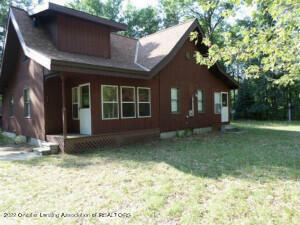 Property Photo:  21425 Caberfae Highway  MI 49689 